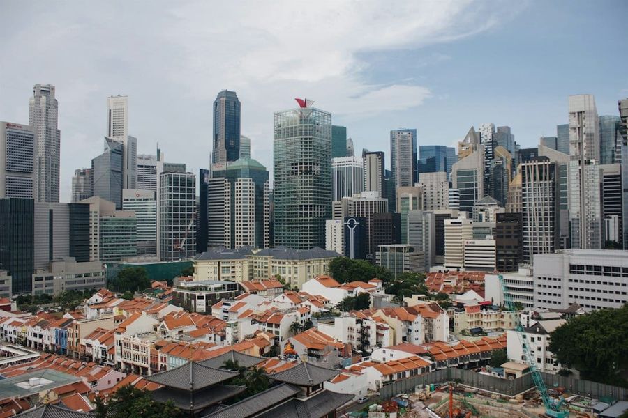 Aerial view of a Singapore landed residential estate with surrounding greenery